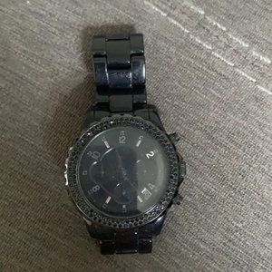 Women’s black MK watch